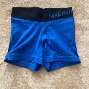 Blue Nike pro shorts